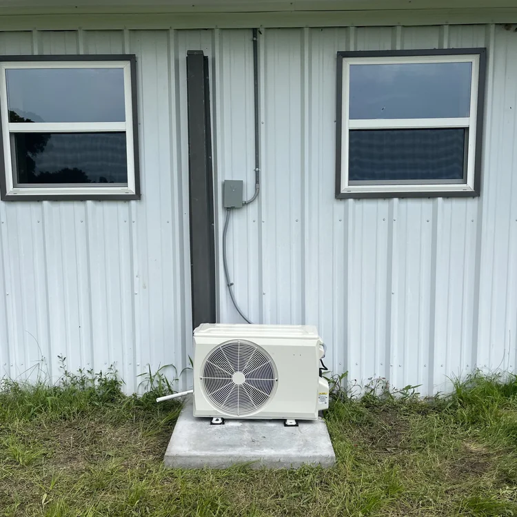 Installed outdoor mini-split equipment shown on Brazos Air’s installation page